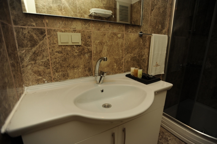 Imagen de la habitación del Qamar Prestige Suites. Foto 5