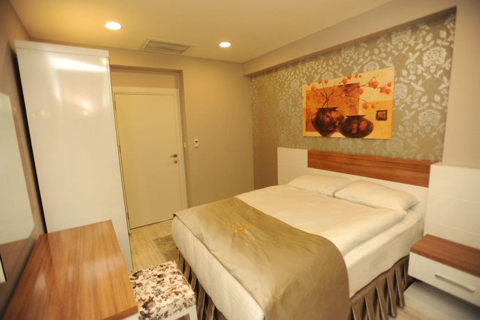 Imagen de la habitación del Qamar Prestige Suites. Foto 7