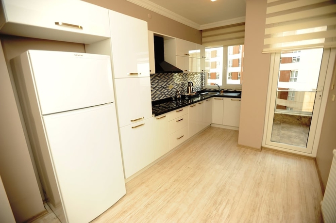 Imagen de la habitación del Qamar Prestige Suites. Foto 9