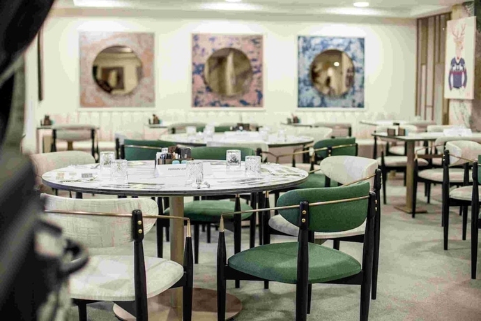 Imagen del bar/restaurante del Qayser Deluxe Hotel. Foto 11