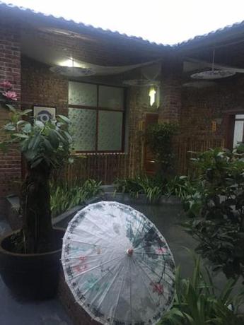 Imagen de la habitación del Qi Chi Zhu Xiang Guesthouse. Foto 8