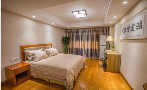 Imagen de la habitación del Qiandaohu Guandao Apartment. Foto 8