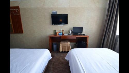 Imagen de la habitación del Qing Mu Hotel Ma'anshan Yushandong Road Oushang Br. Foto 10