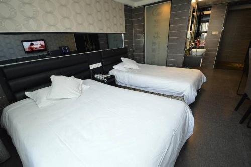 Imagen general del Qing Mu Hotel Ma'anshan Yushandong Road Oushang Br. Foto 7