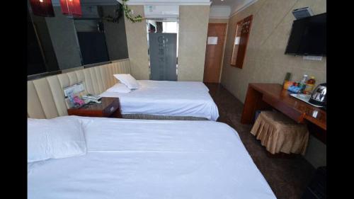 Imagen general del Qing Mu Hotel Ma'anshan Yushandong Road Oushang Br. Foto 9