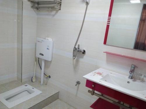 Imagen de la habitación del Qing Qing Inn. Foto 5