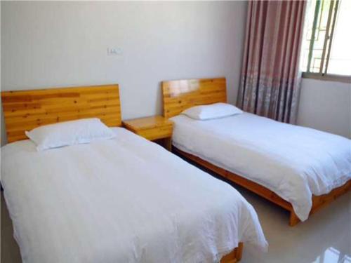 Imagen de la habitación del Qing Qing Inn. Foto 6