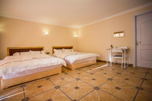 Imagen general del Qing Yuan Gao Pin Hui Bai Lao Hui Superior Spa Vil. Foto 4