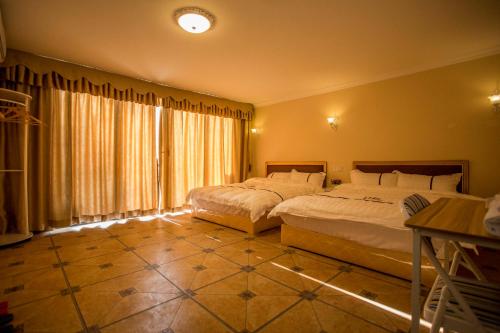 Imagen general del Qing Yuan Gao Pin Hui Bai Lao Hui Superior Spa Vil. Foto 6