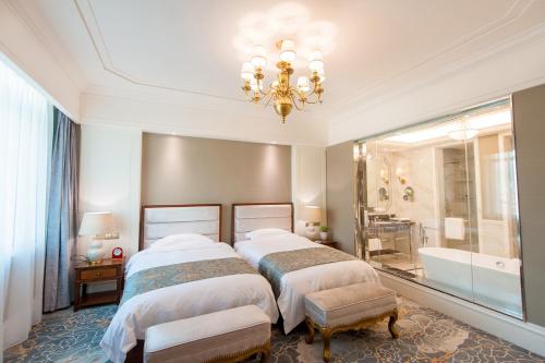 Imagen de la habitación del Qingdao Laoshan Bay Hotel. Foto 7
