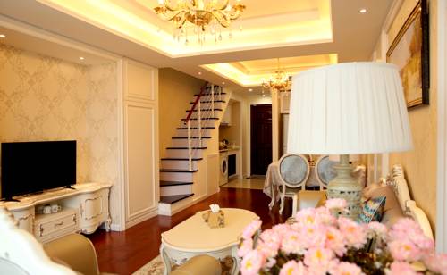 Imagen de la habitación del Qingdao Ssc International Apartment Hotel. Foto 1