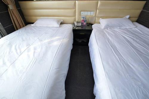 Imagen de la habitación del Qingmu Botique Hotel Ma'anshan Kang Le Road Gui Du. Foto 10