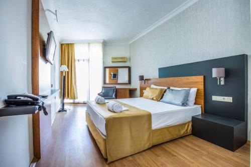 Imagen de la habitación del Qinn Hotel. Foto 18