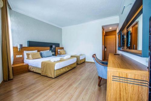 Imagen de la habitación del Qinn Hotel. Foto 19