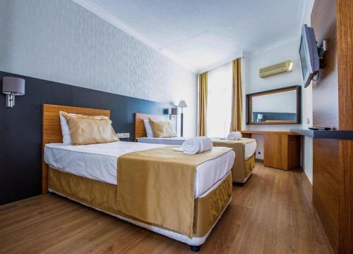 Imagen de la habitación del Qinn Hotel. Foto 20