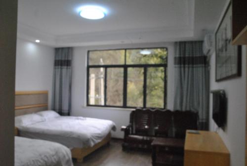 Imagen de la habitación del Qinyuanchun Guesthouse. Foto 7