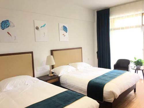 Imagen de la habitación del Qionghai Boao Xishe Guesthouse. Foto 7