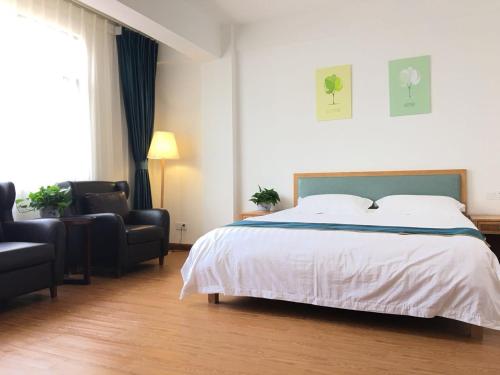 Imagen de la habitación del Qionghai Boao Xishe Guesthouse. Foto 8