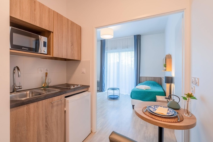 Imagen de la habitación del Quality Aparthotel Moissy-Cramayel. Foto 12