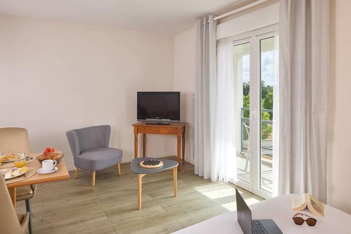 Imagen de la habitación del Quality Aparthotel Portes de Rennes. Foto 7