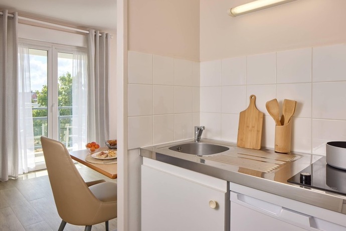 Imagen de la habitación del Quality Aparthotel Portes de Rennes. Foto 8