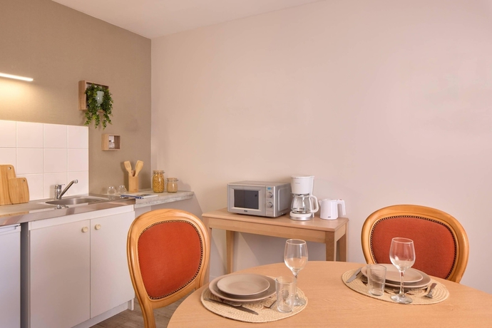 Imagen de la habitación del Quality Aparthotel Portes de Rennes. Foto 10