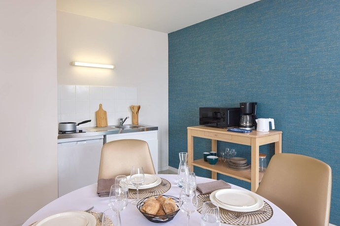 Imagen de la habitación del Quality Aparthotel Portes de Rennes. Foto 13