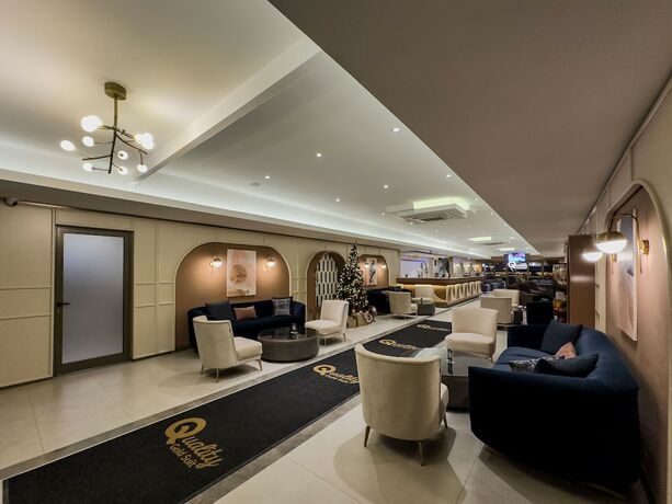 Imagen del bar/restaurante del Quality Gold Suit Hotel. Foto 8