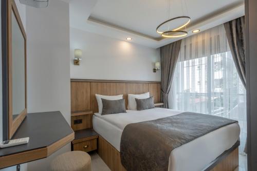 Imagen de la habitación del Quality Gold Suite Hotel. Foto 17