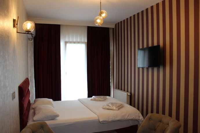 Imagen de la habitación del Quars Suite. Foto 10