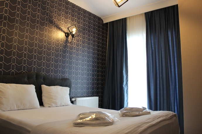 Imagen de la habitación del Quars Suite. Foto 11