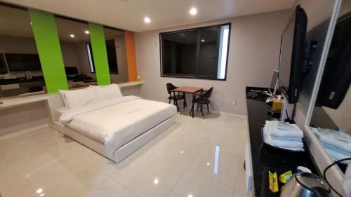 Imagen de la habitación del Queen Hotel, Mokpo. Foto 9