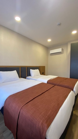 Imagen de la habitación del Questa Deluxe Hotel. Foto 4
