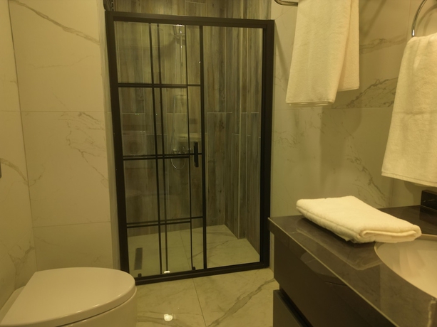 Imagen de la habitación del Questa Deluxe Hotel. Foto 9