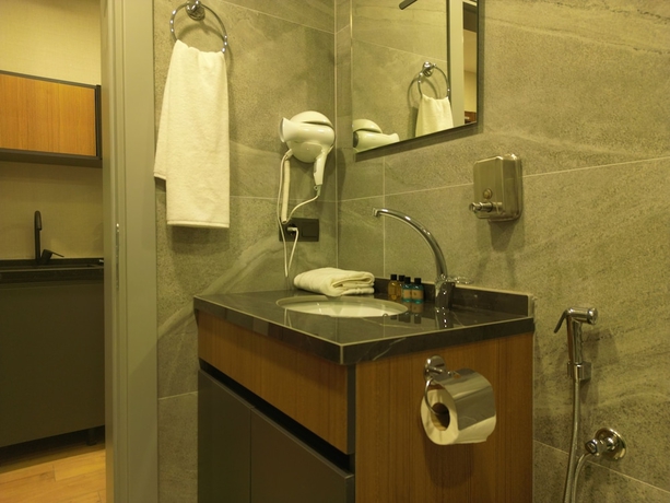 Imagen de la habitación del Questa Deluxe Hotel. Foto 10
