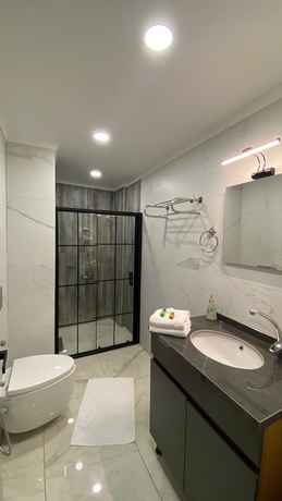 Imagen de la habitación del Questa Deluxe Hotel. Foto 12