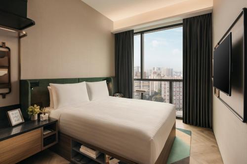 Imagen de la habitación del Quincy House Singapore. Foto 17