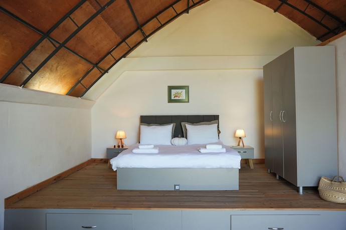 Imagen de la habitación del Quonset Glamping. Foto 11