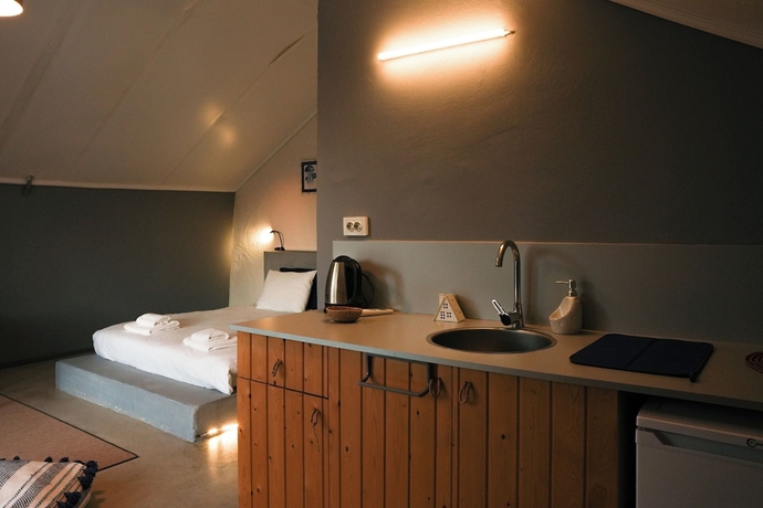 Imagen de la habitación del Quonset Glamping. Foto 15