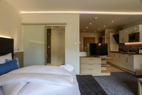Imagen de la habitación del R Appartements. Foto 8