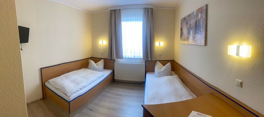 Imagen de la habitación del REGIOHOTEL Salzland. Foto 11