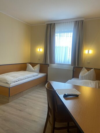 Imagen de la habitación del REGIOHOTEL Salzland. Foto 13