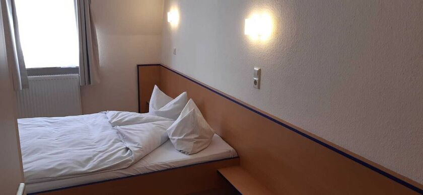 Imagen de la habitación del REGIOHOTEL Salzland. Foto 15