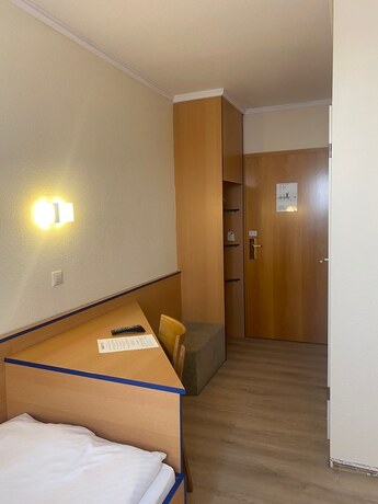 Imagen de la habitación del REGIOHOTEL Salzland. Foto 16