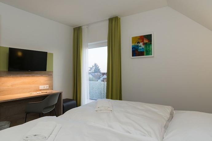 Imagen de la habitación del ROCA Restaurant and Hotel. Foto 2