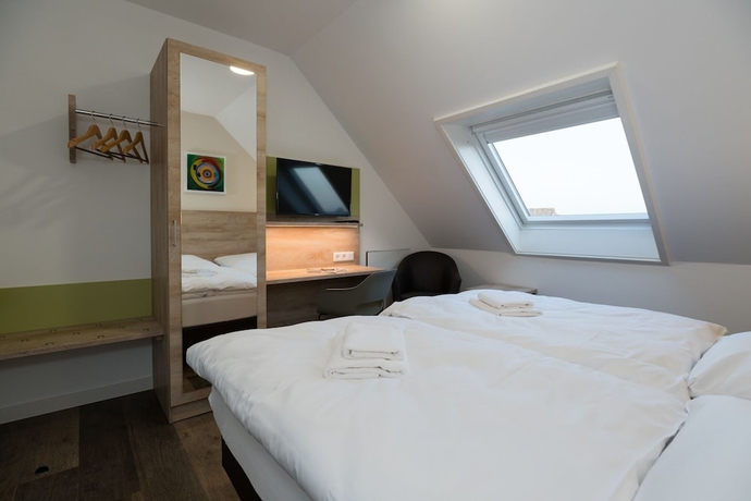 Imagen de la habitación del ROCA Restaurant and Hotel. Foto 8