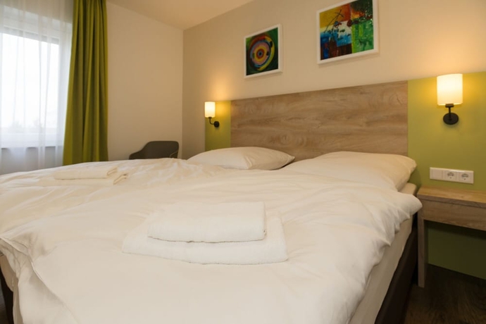 Imagen de la habitación del ROCA Restaurant and Hotel. Foto 12