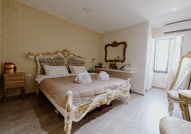 Imagen de la habitación del ROH Suites. Foto 4