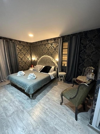 Imagen de la habitación del ROH Suites. Foto 13