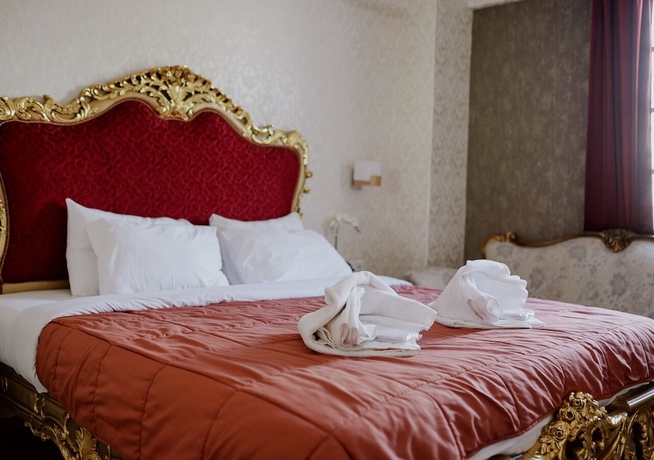 Imagen de la habitación del ROH Suites. Foto 14